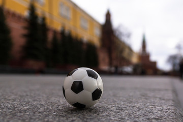 Fototapeta na wymiar Close-up view of a soccer ball with the Moscow Kremlin on the background.