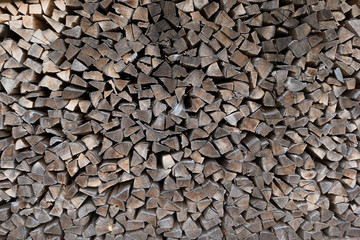 Pile of wood logs. Wood texture background or pattern. Cut timber