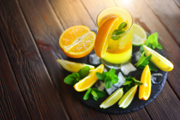 Fresh summer cold lemonade with ice, mint and oranges