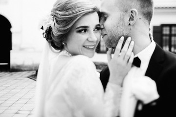 Fototapeta premium Lovely moment of the young couple in the wedding day