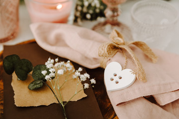 Obraz na płótnie Canvas Linen napkin on wedding rustic table