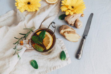 Ginger tea in  cup on linen background