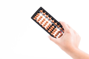 Female hand holding ancient abacus isolated on white