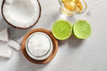 Composition with natural coconut scrub on table