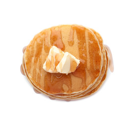 Tasty pancakes with honey and butter on white background © New Africa