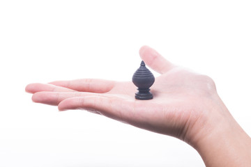 Hand Holding Chess isolated on White