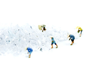 Miniature people : farmers working on the ice.