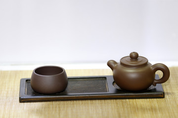 Beautiful purple clay pot, placed on the table
