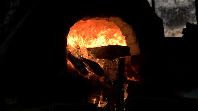 Burning Fire and Smoke Over a Kiln Slow Motion