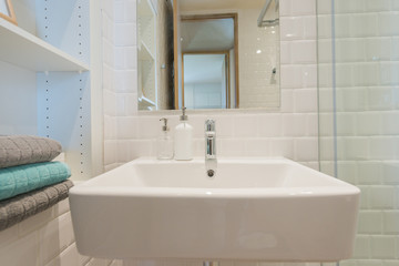 Obraz na płótnie Canvas Bathroom interior with sink and faucet.