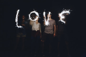 Sparklers forming the word love