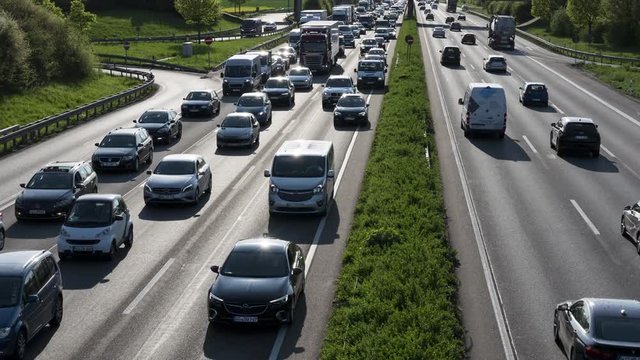 Traffic jam on German highway A66 nearby Wiesbadener Kreuz during rush hour - time lapse