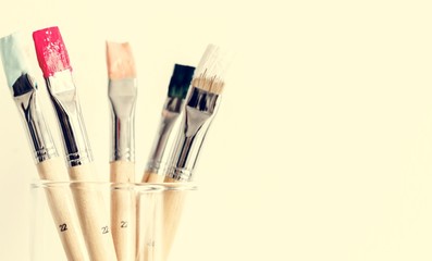 Fototapeta premium Paintbrush Art Tool in a Transparent Glass