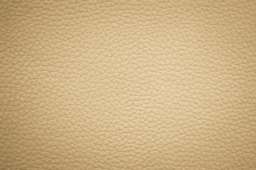 Old vintage brown abstract leather texture or upholstery pattern closeup can be used as background.