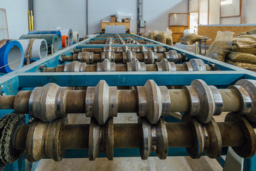 Profiling rolls of sheet forming machine close up