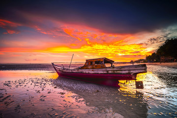 Fototapeta na wymiar The Sunset Behind a Boat