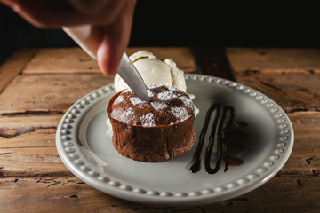 chocolate coulant or fondant cutting Melting delicious pudding and ice cream