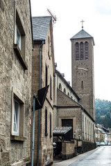 A small church with a tower clock in the old rural village of Rieden Germany