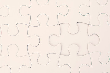 Close up white jigsaw background