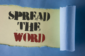 Writing note showing  Spread The Word. Business photo showcasing Run advertisements to increase store sales many fold written under Tear Folded paper on plain White background.