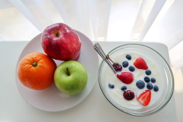 Yogurt with fruits for healthy lifestyle in morning.