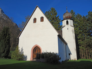 Fototapeta premium Traditional Austrian church in mountain environment