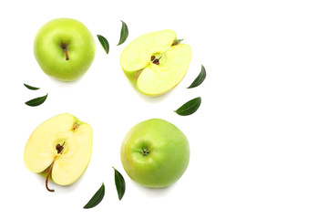 green apples with slices isolated on white background. top view