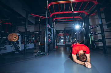 the athlete rests after training in the gym