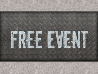 FREE EVENT painted on metal panel wall.