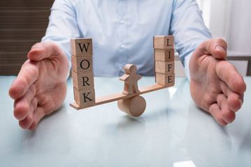 Businessperson Protecting Balance Between Life And Work
