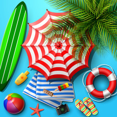 Summer holidays background in the blue beach sand. Top view of beach element collections