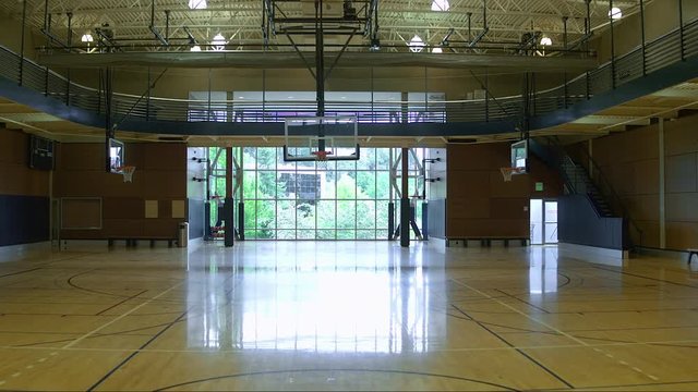 An empty basketball court during daytime