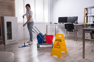 Wet Floor Caution Sign On Floor