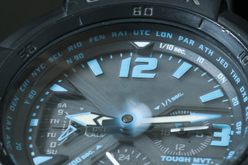 Analog wrist watch closeup with minute pointer in movement, Time flies concept