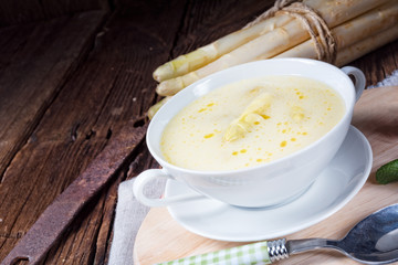 rustic white asparagus cream soup with butter