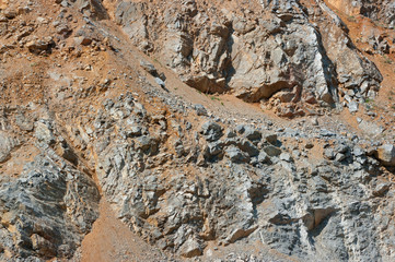 A close-up view of the walls of an old abandoned quarry. In this quarry, limestone was mined.