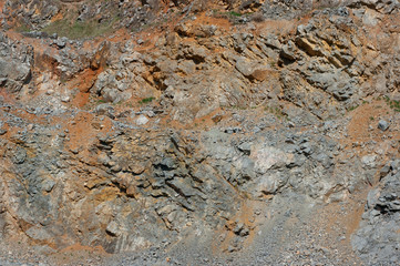 A close-up view of the walls of an old abandoned quarry. In this quarry, limestone was mined.
