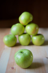 Many green large apples