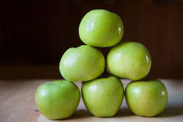Many green large apples