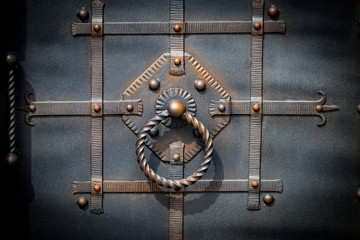 door decoration with ornate wrought-iron elements, close up