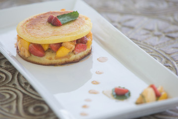 Delicious pancakes close up with fresh fruits healthy breakfast concept