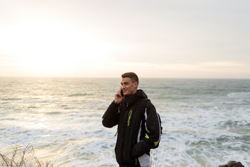 man talking on the phone and smiling