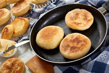baking classic english muffins, close up