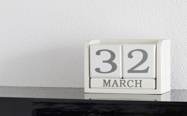 White block calendar present date 32 and month March - Extra day