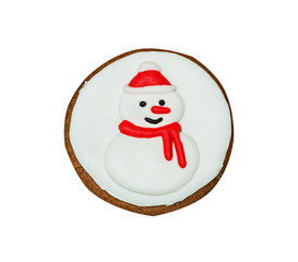 Figure snowman, gingerbread, covered with white and red glaze. Isolated on white background.