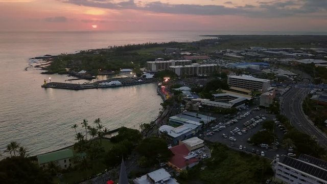 Aerial view of sunset over the famous Hawaiian Kailua-Kona city and bay, USA