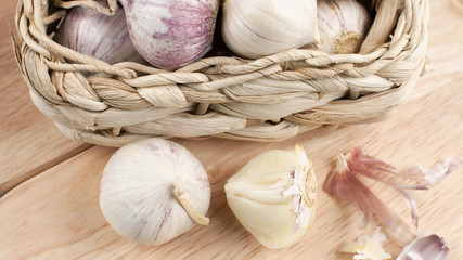 White large garlic in a wicker basket