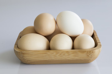 isolated eggs on the ground. eggs concept for kitchen art.