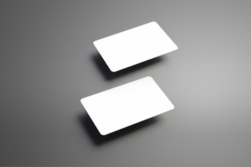 Stylish blank mockup of a two  bank gift cards on a gray background.