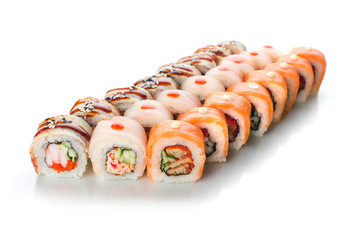 On white background isolated with reflection, sushi rolls Japanese cuisine beautiful lot set different